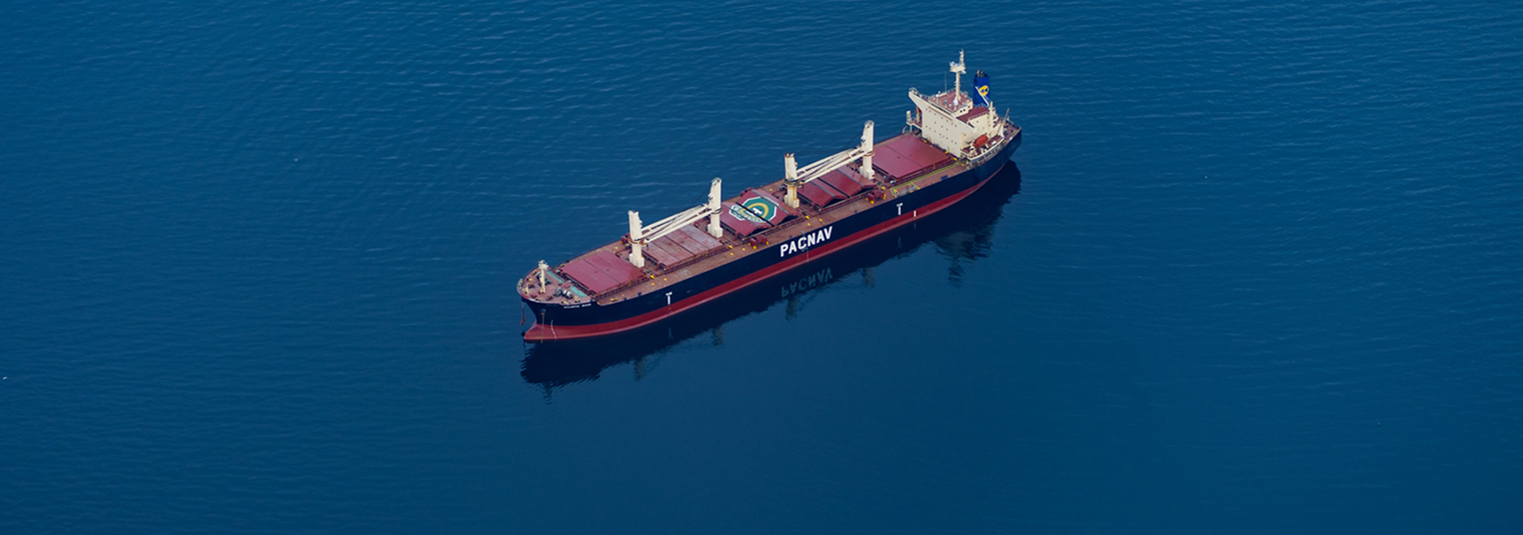 Cargo ship carrying goods crossing the ocean